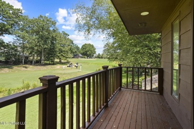 This mid-century modern home has been tastefully updated while on Colonial Country Club Deerfield in Mississippi - for sale on GolfHomes.com, golf home, golf lot