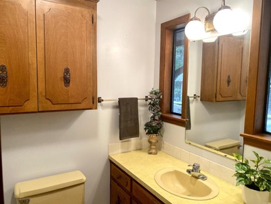 This late 70's built home is so WELL PRESERVED, you'll feel like on DeSoto Golf Course in Arkansas - for sale on GolfHomes.com, golf home, golf lot