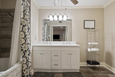 This mid-century modern home has been tastefully updated while on Colonial Country Club Deerfield in Mississippi - for sale on GolfHomes.com, golf home, golf lot