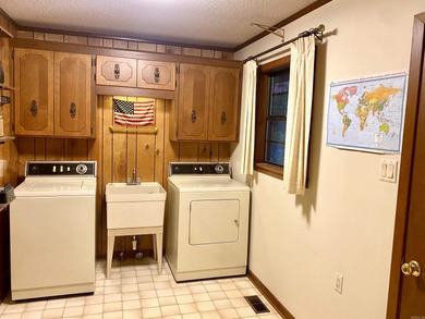 This late 70's built home is so WELL PRESERVED, you'll feel like on DeSoto Golf Course in Arkansas - for sale on GolfHomes.com, golf home, golf lot