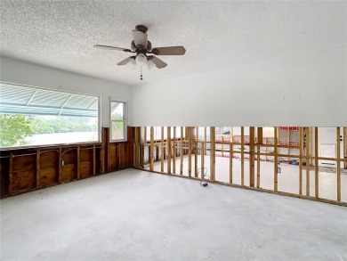 This waterfront property truly presents an incredible on Gulf Harbors Golf Course in Florida - for sale on GolfHomes.com, golf home, golf lot