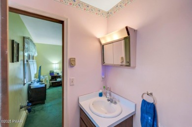 Lovingly maintained by its original owners, this charming home on The Hideout Golf in Pennsylvania - for sale on GolfHomes.com, golf home, golf lot
