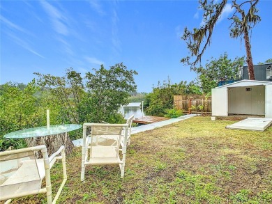 This waterfront property truly presents an incredible on Gulf Harbors Golf Course in Florida - for sale on GolfHomes.com, golf home, golf lot