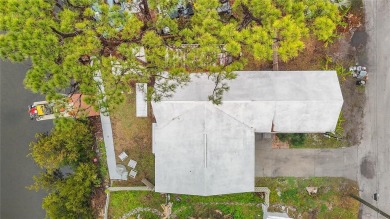 This waterfront property truly presents an incredible on Gulf Harbors Golf Course in Florida - for sale on GolfHomes.com, golf home, golf lot