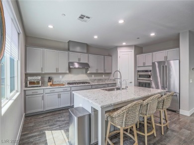 Distinguished 3-story brownstone-style townhome on a premium on Reflection Bay Golf Club in Nevada - for sale on GolfHomes.com, golf home, golf lot