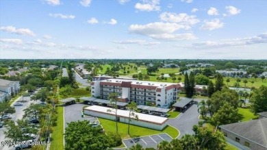 RARE FIND....Harbor Green Community Condo with GARAGE AND on Mallards Landing Golf Course in Florida - for sale on GolfHomes.com, golf home, golf lot