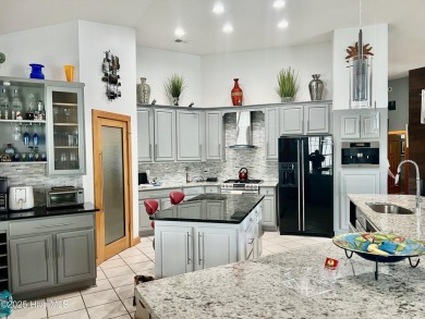 STUNNING HOME WITH WATER & GOLF COURSE VIEWS-YOUR EVERYDAY on Sandpiper Bay Golf and Country Club in North Carolina - for sale on GolfHomes.com, golf home, golf lot