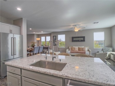 Distinguished 3-story brownstone-style townhome on a premium on Reflection Bay Golf Club in Nevada - for sale on GolfHomes.com, golf home, golf lot