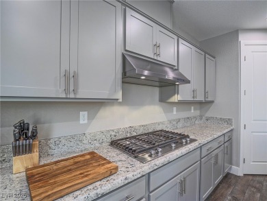 Distinguished 3-story brownstone-style townhome on a premium on Reflection Bay Golf Club in Nevada - for sale on GolfHomes.com, golf home, golf lot