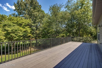 Nestled in the highly sought-after Tommotley Coves neighborhood on Tanasi Golf Course in Tennessee - for sale on GolfHomes.com, golf home, golf lot