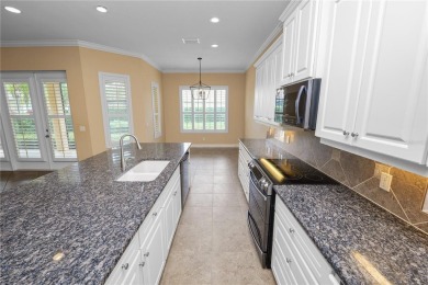 This Two Bedroom / Two Baths Plus a Den / Office / Workout Room on Grasslands Golf and Country Club in Florida - for sale on GolfHomes.com, golf home, golf lot