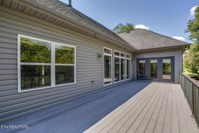 Nestled in the highly sought-after Tommotley Coves neighborhood on Tanasi Golf Course in Tennessee - for sale on GolfHomes.com, golf home, golf lot