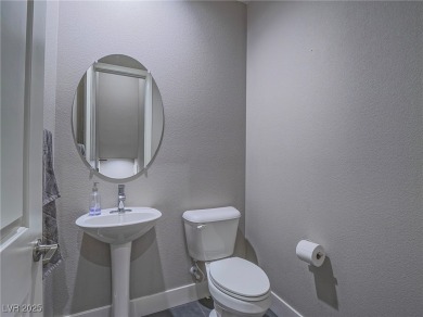 Distinguished 3-story brownstone-style townhome on a premium on Reflection Bay Golf Club in Nevada - for sale on GolfHomes.com, golf home, golf lot