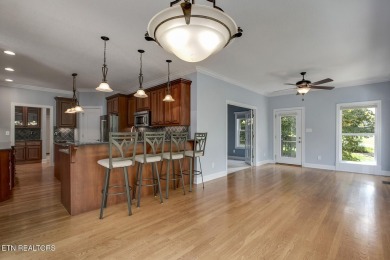 Nestled in the highly sought-after Tommotley Coves neighborhood on Tanasi Golf Course in Tennessee - for sale on GolfHomes.com, golf home, golf lot