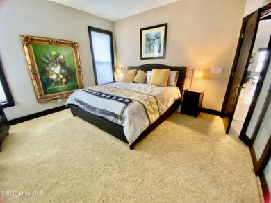 STUNNING HOME WITH WATER & GOLF COURSE VIEWS-YOUR EVERYDAY on Sandpiper Bay Golf and Country Club in North Carolina - for sale on GolfHomes.com, golf home, golf lot