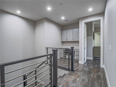Distinguished 3-story brownstone-style townhome on a premium on Reflection Bay Golf Club in Nevada - for sale on GolfHomes.com, golf home, golf lot