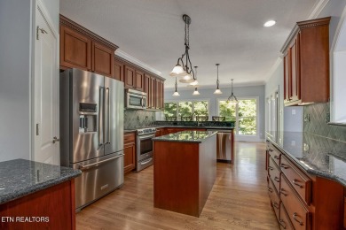 Nestled in the highly sought-after Tommotley Coves neighborhood on Tanasi Golf Course in Tennessee - for sale on GolfHomes.com, golf home, golf lot