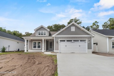 Located on the Golf Course! Tour this one level living home on Brick Landing Plantation Yacht and Golf Club in North Carolina - for sale on GolfHomes.com, golf home, golf lot
