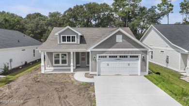 Located on the Golf Course! Tour this one level living home on Brick Landing Plantation Yacht and Golf Club in North Carolina - for sale on GolfHomes.com, golf home, golf lot