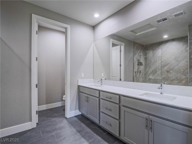 Distinguished 3-story brownstone-style townhome on a premium on Reflection Bay Golf Club in Nevada - for sale on GolfHomes.com, golf home, golf lot