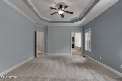 Nestled in the highly sought-after Tommotley Coves neighborhood on Tanasi Golf Course in Tennessee - for sale on GolfHomes.com, golf home, golf lot