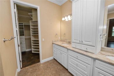 This Two Bedroom / Two Baths Plus a Den / Office / Workout Room on Grasslands Golf and Country Club in Florida - for sale on GolfHomes.com, golf home, golf lot