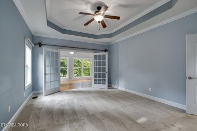 Nestled in the highly sought-after Tommotley Coves neighborhood on Tanasi Golf Course in Tennessee - for sale on GolfHomes.com, golf home, golf lot