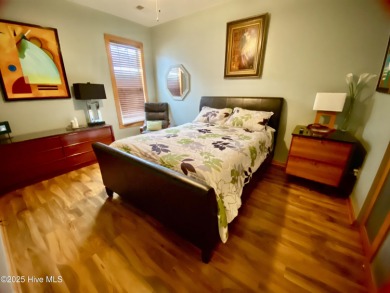 STUNNING HOME WITH WATER & GOLF COURSE VIEWS-YOUR EVERYDAY on Sandpiper Bay Golf and Country Club in North Carolina - for sale on GolfHomes.com, golf home, golf lot