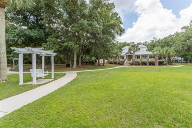 This exceptional lot is located on the first tee, offering on The Golf Club At Sanctuary Cove in Georgia - for sale on GolfHomes.com, golf home, golf lot