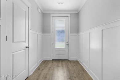 Located on the Golf Course! Tour this one level living home on Brick Landing Plantation Yacht and Golf Club in North Carolina - for sale on GolfHomes.com, golf home, golf lot