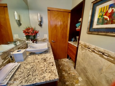 STUNNING HOME WITH WATER & GOLF COURSE VIEWS-YOUR EVERYDAY on Sandpiper Bay Golf and Country Club in North Carolina - for sale on GolfHomes.com, golf home, golf lot
