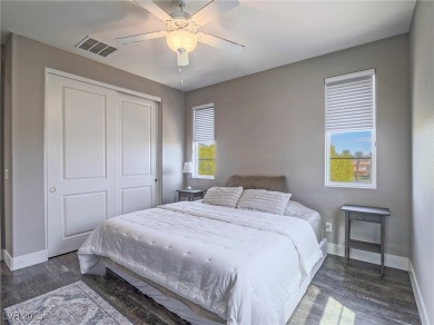 Distinguished 3-story brownstone-style townhome on a premium on Reflection Bay Golf Club in Nevada - for sale on GolfHomes.com, golf home, golf lot