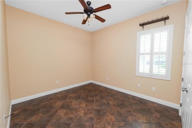 This Two Bedroom / Two Baths Plus a Den / Office / Workout Room on Grasslands Golf and Country Club in Florida - for sale on GolfHomes.com, golf home, golf lot