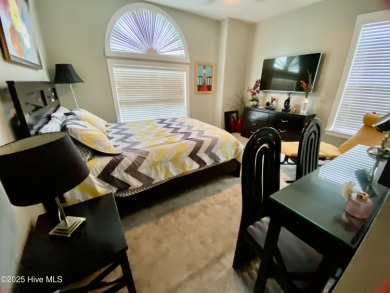 STUNNING HOME WITH WATER & GOLF COURSE VIEWS-YOUR EVERYDAY on Sandpiper Bay Golf and Country Club in North Carolina - for sale on GolfHomes.com, golf home, golf lot