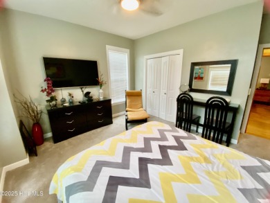 STUNNING HOME WITH WATER & GOLF COURSE VIEWS-YOUR EVERYDAY on Sandpiper Bay Golf and Country Club in North Carolina - for sale on GolfHomes.com, golf home, golf lot