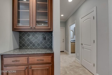 Nestled in the highly sought-after Tommotley Coves neighborhood on Tanasi Golf Course in Tennessee - for sale on GolfHomes.com, golf home, golf lot