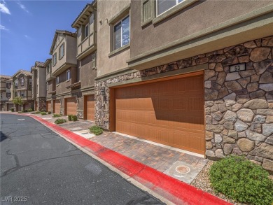 Distinguished 3-story brownstone-style townhome on a premium on Reflection Bay Golf Club in Nevada - for sale on GolfHomes.com, golf home, golf lot