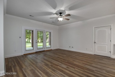 Nestled in the highly sought-after Tommotley Coves neighborhood on Tanasi Golf Course in Tennessee - for sale on GolfHomes.com, golf home, golf lot