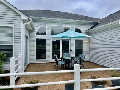 STUNNING HOME WITH WATER & GOLF COURSE VIEWS-YOUR EVERYDAY on Sandpiper Bay Golf and Country Club in North Carolina - for sale on GolfHomes.com, golf home, golf lot