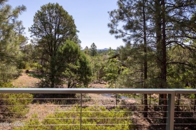 Tucked away, among the tall pines, and beautifully mixed on Torreon Golf Club in Arizona - for sale on GolfHomes.com, golf home, golf lot