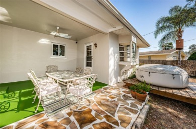 This Mid-Century Modern ranch home is centrally located just on The Dunedin Country Club in Florida - for sale on GolfHomes.com, golf home, golf lot