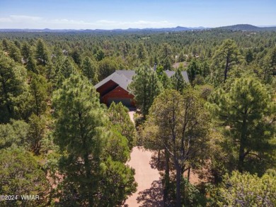 Tucked away, among the tall pines, and beautifully mixed on Torreon Golf Club in Arizona - for sale on GolfHomes.com, golf home, golf lot