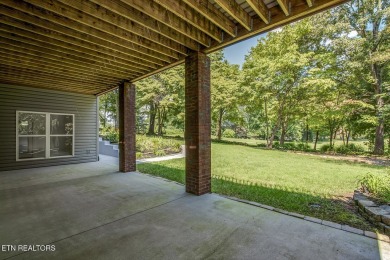 Nestled in the highly sought-after Tommotley Coves neighborhood on Tanasi Golf Course in Tennessee - for sale on GolfHomes.com, golf home, golf lot