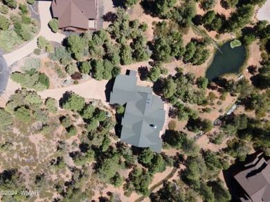 Tucked away, among the tall pines, and beautifully mixed on Torreon Golf Club in Arizona - for sale on GolfHomes.com, golf home, golf lot