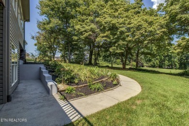 Nestled in the highly sought-after Tommotley Coves neighborhood on Tanasi Golf Course in Tennessee - for sale on GolfHomes.com, golf home, golf lot