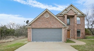 This stunning two story is perfectly situated between Shadow on White Bluff Resort - New Course in Texas - for sale on GolfHomes.com, golf home, golf lot