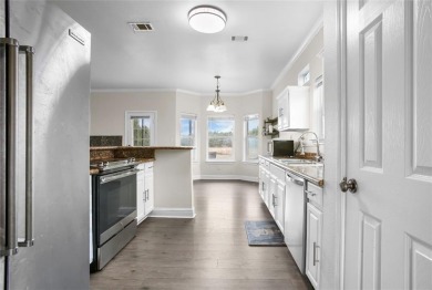 This stunning two story is perfectly situated between Shadow on White Bluff Resort - New Course in Texas - for sale on GolfHomes.com, golf home, golf lot