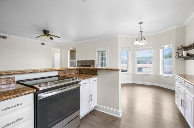 This stunning two story is perfectly situated between Shadow on White Bluff Resort - New Course in Texas - for sale on GolfHomes.com, golf home, golf lot