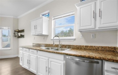 This stunning two story is perfectly situated between Shadow on White Bluff Resort - New Course in Texas - for sale on GolfHomes.com, golf home, golf lot