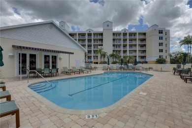 Welcome to your dream home! This stunning top-floor condominium on East Bay Golf Club in Florida - for sale on GolfHomes.com, golf home, golf lot